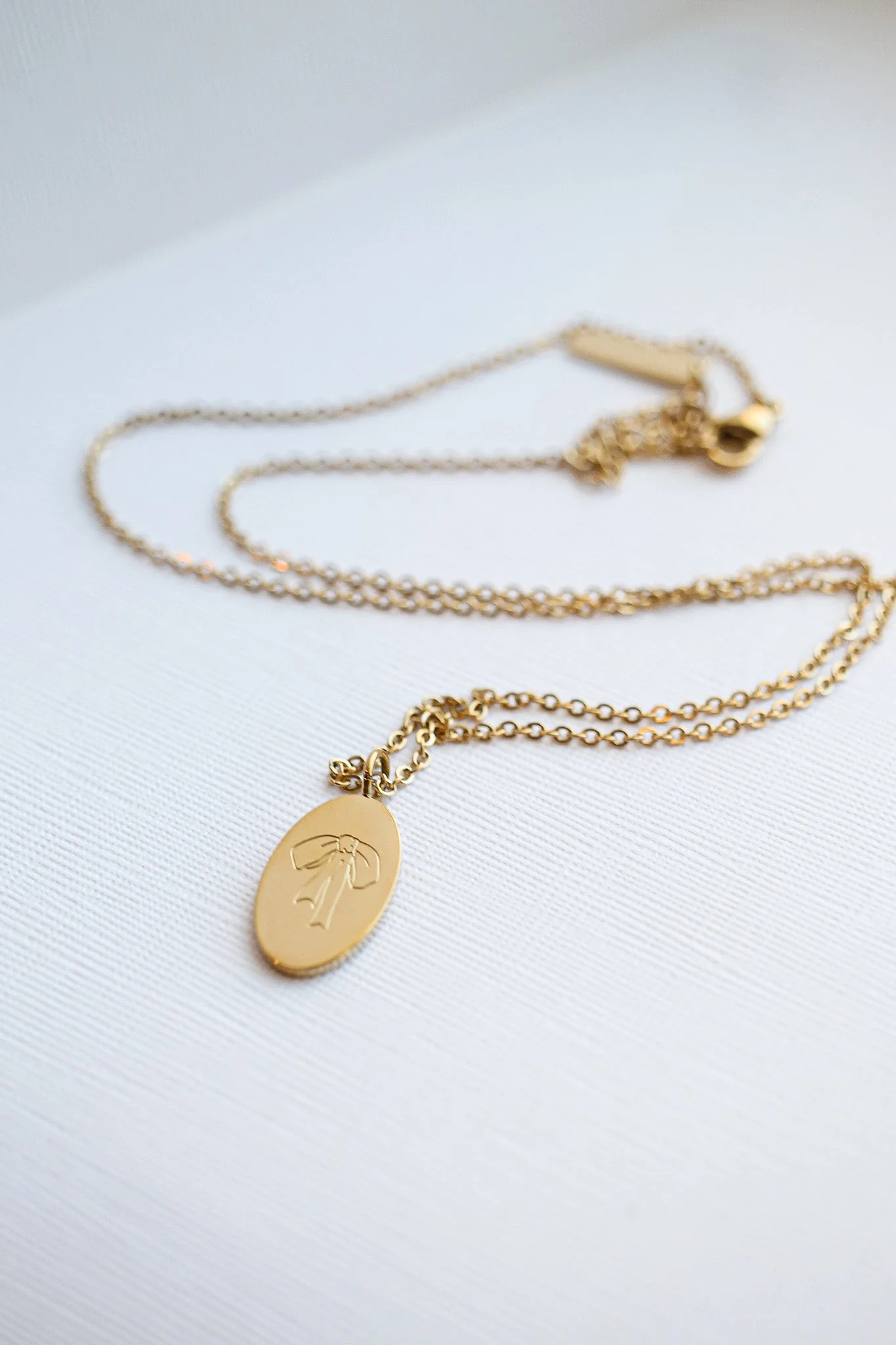 Bow Pendant Necklace in Gold - Image 3